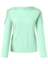 Front view of light green FloraFrost™ Tee highlighting lace floral cutout shoulders and round neckline.