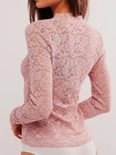 Back view of dusty pink Laceaura Top revealing lace pattern and subtle sheerness.