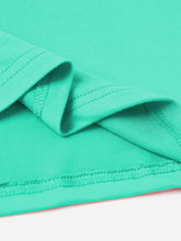 Close up view of the CaliVista Round Neck Tee's fabric and clean stitching in aqua.