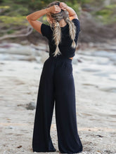 Auralenne Coastal Lounge Set in black back view on the beach
