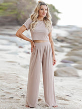 Auralenne Coastal Lounge Set in tan front view styled on the beach