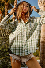 Model wearing the BiBi Casual Check Shirt with Hood paired with distressed jean shorts for a casual look.