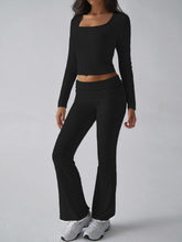 Black Liahnique set styled with white sneakers for casual athleisure look
