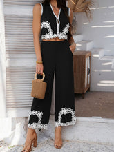 Model styled in Black Xyvello set with heels and woven straw handbag