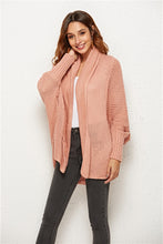 Woman modeling SeraphinaWing Open Front Cardigan in Blush Pink, front-facing with loose batwing sleeves.