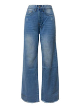 Close-up of raw hem detailin on BluviaFold™ wide leg jeans