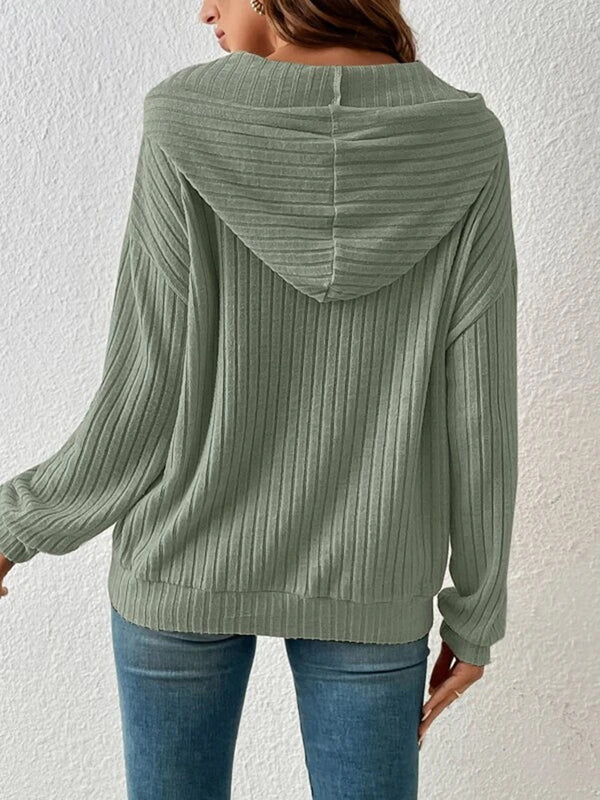Back view of the Calvessa Hoodie in gum leaf, highlighting the cozy hood, straight hem, and soft, ribbed material.