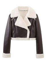 Front zoomed-in detail of faux leather texture and sherpa trim on the chocolate Nuvira Frostloom jacket.
