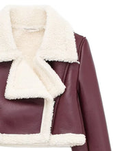 Close-up of faux sherpa collar and zipper on the burgundy Nuvira Frostloom cropped jacket.
