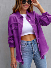 Close-up view of model wearing a violet CloudKitten Distressed Drop Shoulder Denim Jacket, with relaxed fit, button-front design, and visible chest pockets.