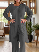Close up full body pose of Kurevelle Slit Round Neck Top and Pants Twosome in dark gray