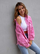 Front view of model wearing a hot pink CloudKitten Distressed Drop Shoulder Denim Jacket, featuring button-up closure, light distressing, and chest pockets