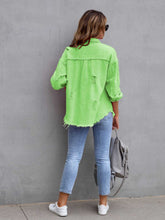 Back view of model in a lime CloudKitten Distressed Drop Shoulder Denim Jacket, showing subtle distressed accents and a loose, casual silhouette.