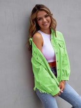 Front view of model in a lime CloudKitten Distressed Drop Shoulder Denim Jacket, showcasing subtle distressing, button-up front, and classic collar.
