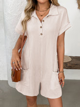 Close-up of eggshell romper’s texture and pocket details.