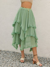 Elurevyn gum leaf polka dot print lace midi skirt styled with casual tan top and heels