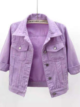A front photo of the lavender Full Size Cropped Denim Plus Size Jacket on a clothes hanger.