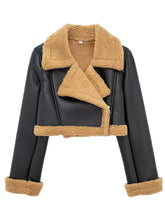 Front zoomed-in detail of faux leather texture and sherpa trim on the black Nuvira Frostloom jacket.