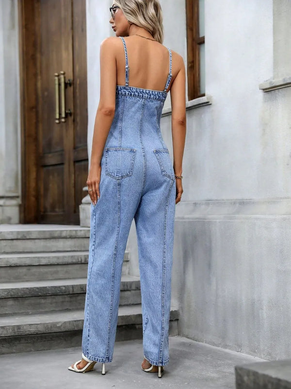 Back view of model in Gildoria™ Spaghetti Strap Denim Overalls, highlighting adjustable straps and functional back pockets.