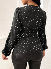 Back view illustrating the AmoréDot top's fit and design.
