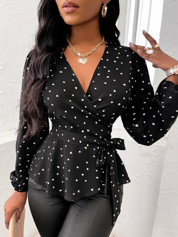 Model styled in black AmoréDot™ Top with leather pants, heels, and accessories for a complete look.