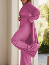 Side view of Kurevelle Slit Round Neck Top and Pants Twosome in cerise showing wide leg and slit top