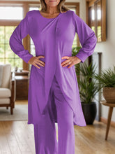 Close up full body pose of Kurevelle Slit Round Neck Top and Pants Twosome in purple