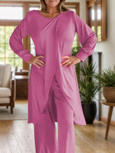 Close up full body pose of Kurevelle Slit Round Neck Top and Pants Twosome in Cerise 