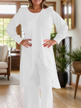 Close up full body pose of Kurevelle Slit Round Neck Top and Pants Twosome in white 