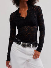 Laceaura V-Neck Lace Top in black styled with white distressed jeans and ankle boots.