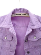 A close up photo of the mid sleeve, pocket detailing, and quality fabric of a lavender Full Size Cropped Denim Plus Size Jacket.