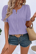 Front view of lavender Wavelle Blouse showcasing wavy texture and U-neck slit.