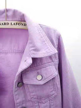 A close up photo of the collar, button detail, pocket, and quality fabric of a lavender Full Size Cropped Denim Plus Size Jacket.