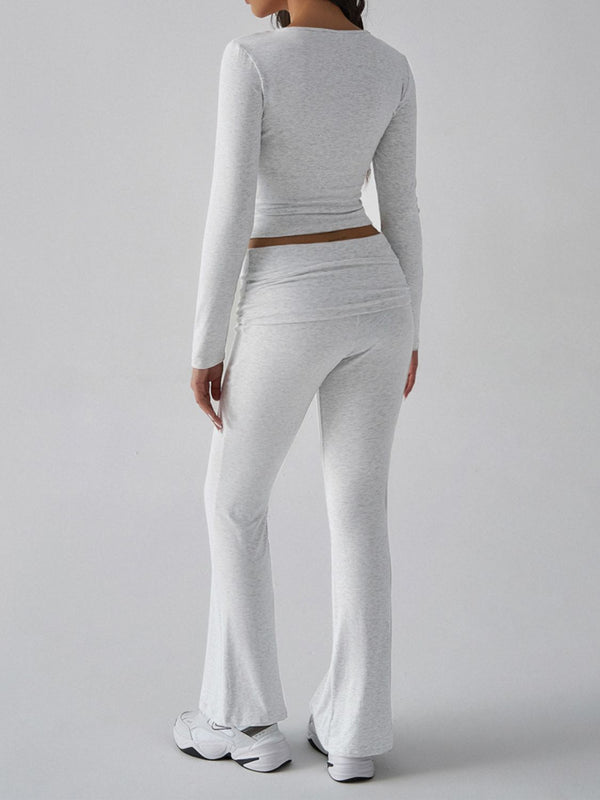 Back view of model wearing Light Gray Liahnique square neck top and ruched waist bootcut pants