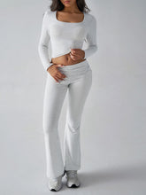 Model in Light Gray Liahnique set front view showcasing square neck top and ruched hem pants