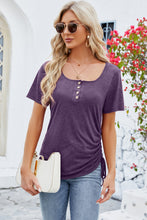 Model wearing a mauve square neck short sleeve T-shirt with gathered ruching detail at the bust.