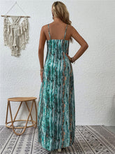 Back shot photo of woman posing in the soft turquoise Jewel of Northern Lights Scoop Neck Maxi Cami Dress paired with jewlery.