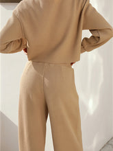 Close up back angle of woman wearing Mellara Khaki Waffle-Knit Round Neck Top and Pants Set
