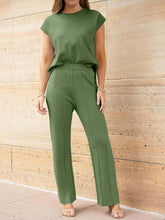 Mirajella Luxe Pleated Knit Set in matcha green styled with heels front view