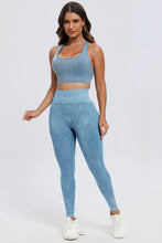 Model walking outdoors in light blue LineaFlow Vitality set.