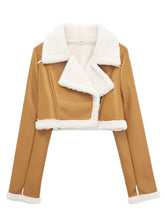 Front zoomed-in detail of faux leather texture and sherpa trim on the mustard Nuvira Frostloom jacket.