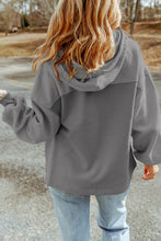 Back view of the cloud blue Nivora™ DriftZip Hooded Jacket, highlighting the relaxed fit, drawstring hood, and clean seam detailing.