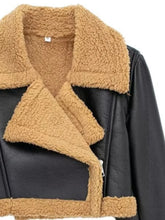 Close-up of faux sherpa collar and zipper on the black Nuvira Frostloom cropped jacket.