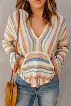 Front view of a woman in the Ollavon Multi-Stripe Hoodie, highlighting cheerful stripes, soft knit fabric, and a cozy front pocket.
