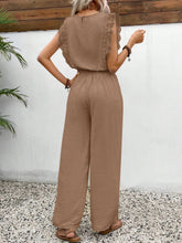 Close-up of the taupe Papiloniya™ Lace Trim Round Neck Top showing delicate lace trim on the neckline and ruffled cap sleeves, with a back button closure.