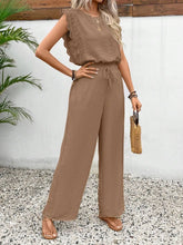 Model posing in Papiloniya™ Lace Trim Top and Pants Set, styled with jewelry and heels, perfect for a casual outing or evening event.