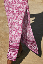 PetalVista carnation pink skirt close-up highlighting side slit and premium fabric texture