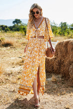 Model wearing PetalVista sherbet set walking among Egyptian ruins