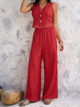 Model in Rust Quevella Duo Set, front view in a sunlit loft