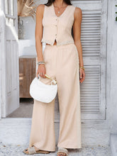 Model styled in Tan Quevella Duo Set with handbag and huaraches
